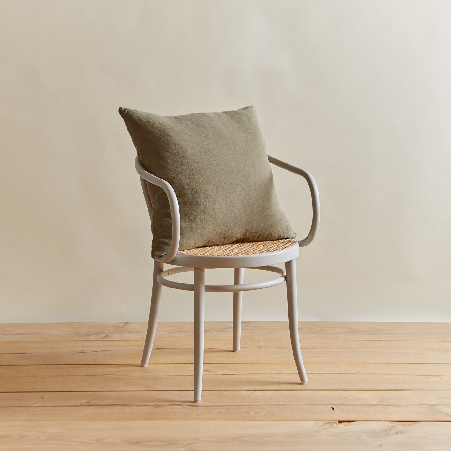 Simple linen pillow in olive