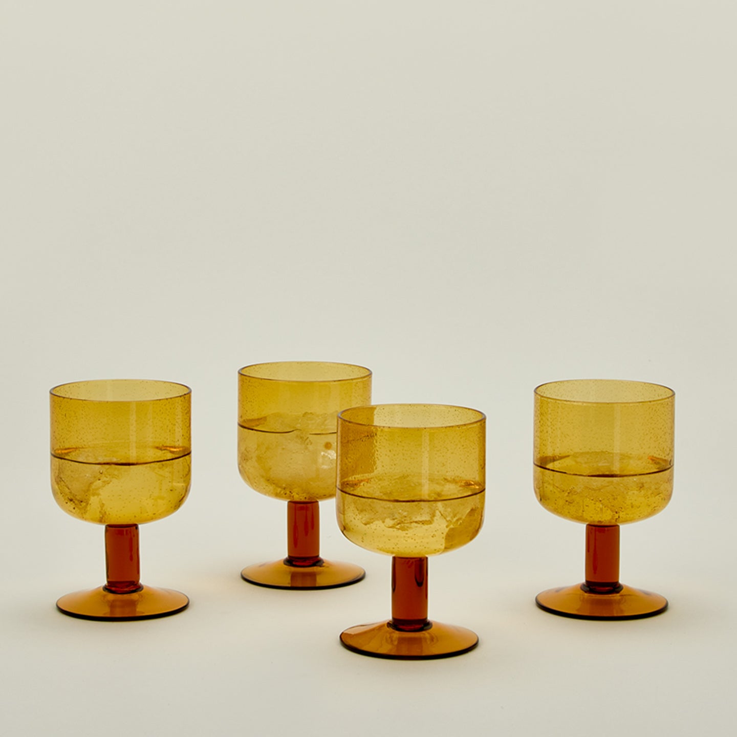 Simple seeded glassware in amber