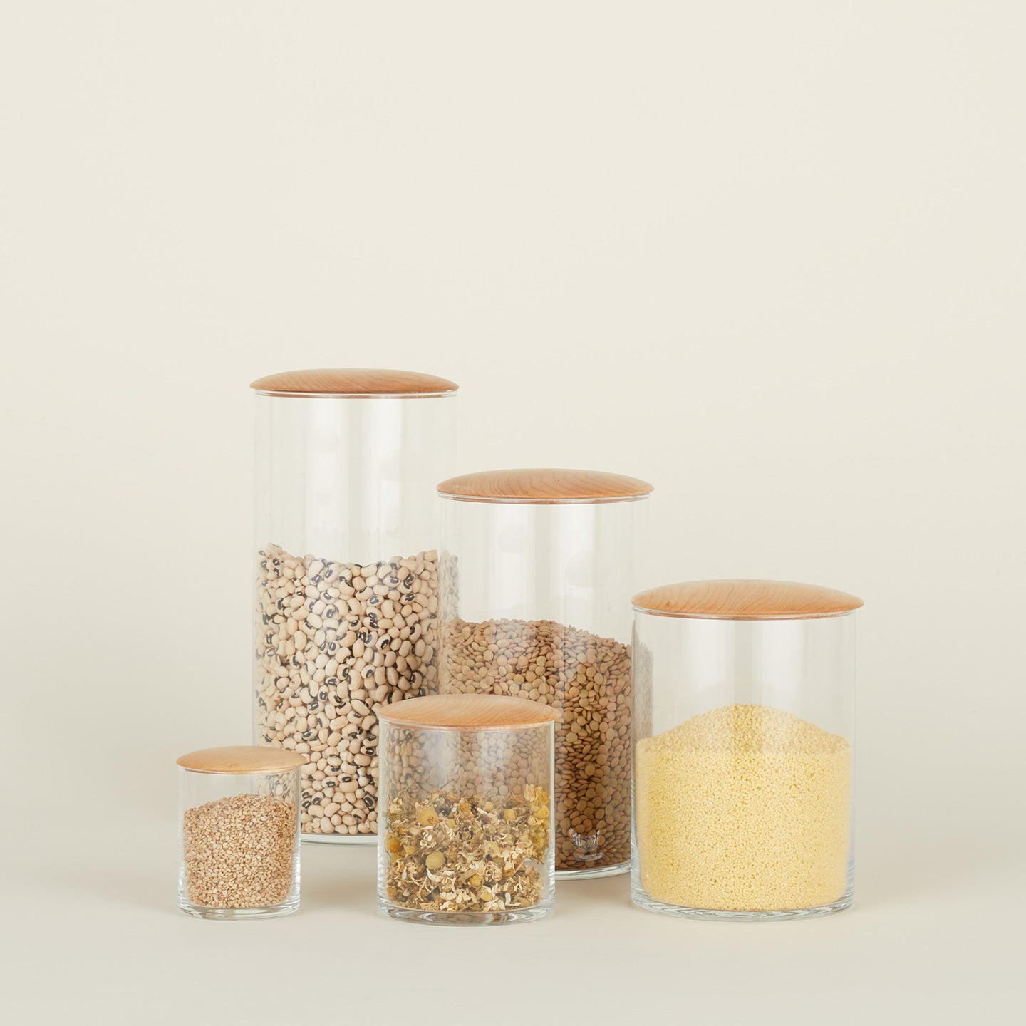 Simple storage container group filled in maple