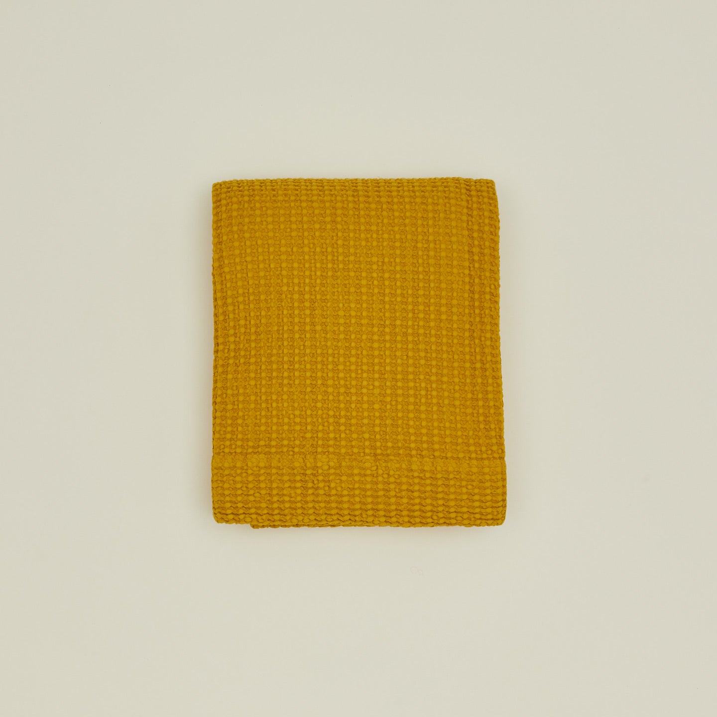 Simple waffle shower curtain in mustard