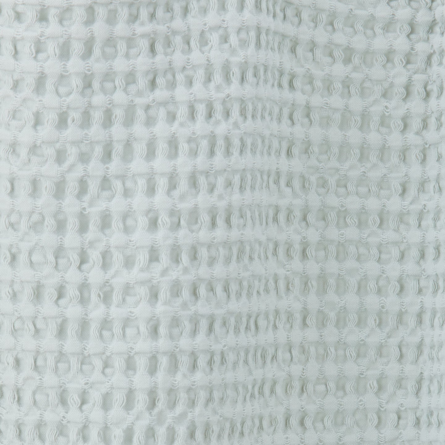 Close up view of simple waffle shower curtain in sky