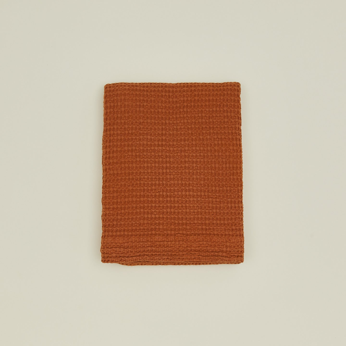 Simple waffle shower curtain in terracotta