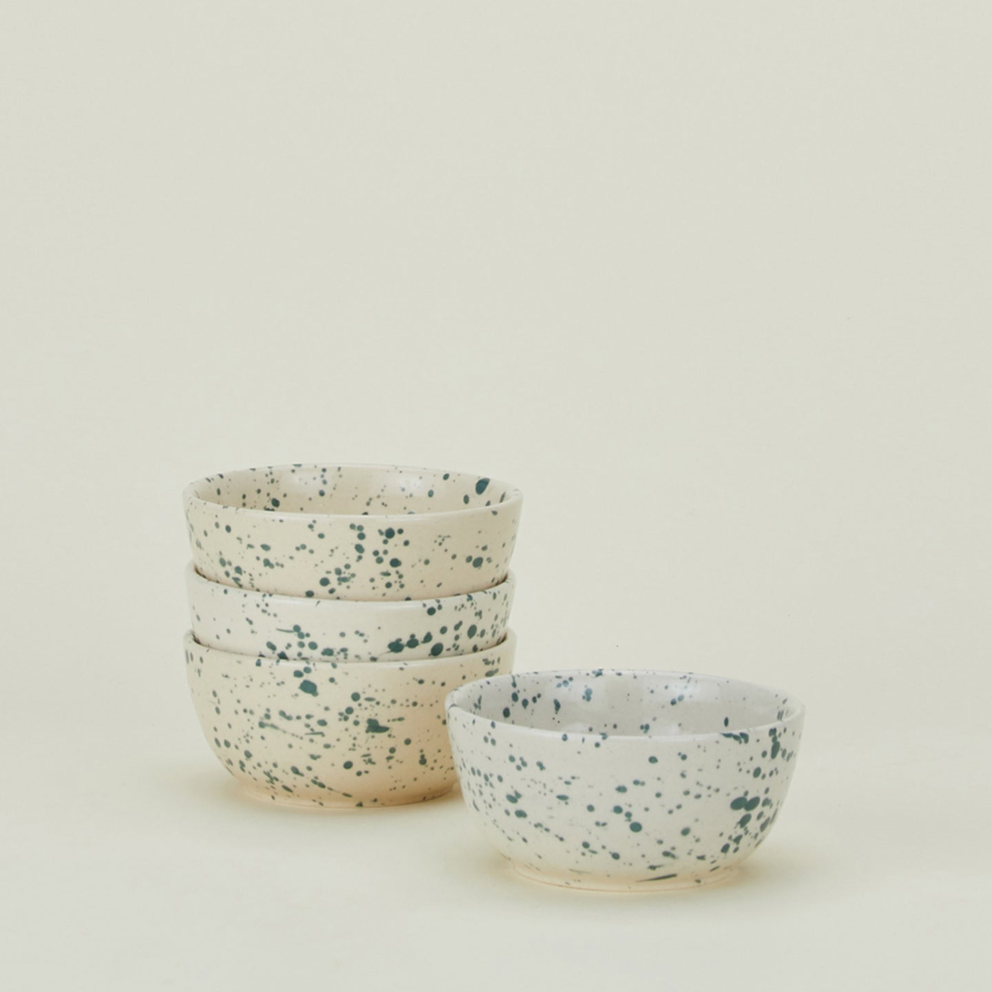 Set of four Splatterware bowls in Nettle.
