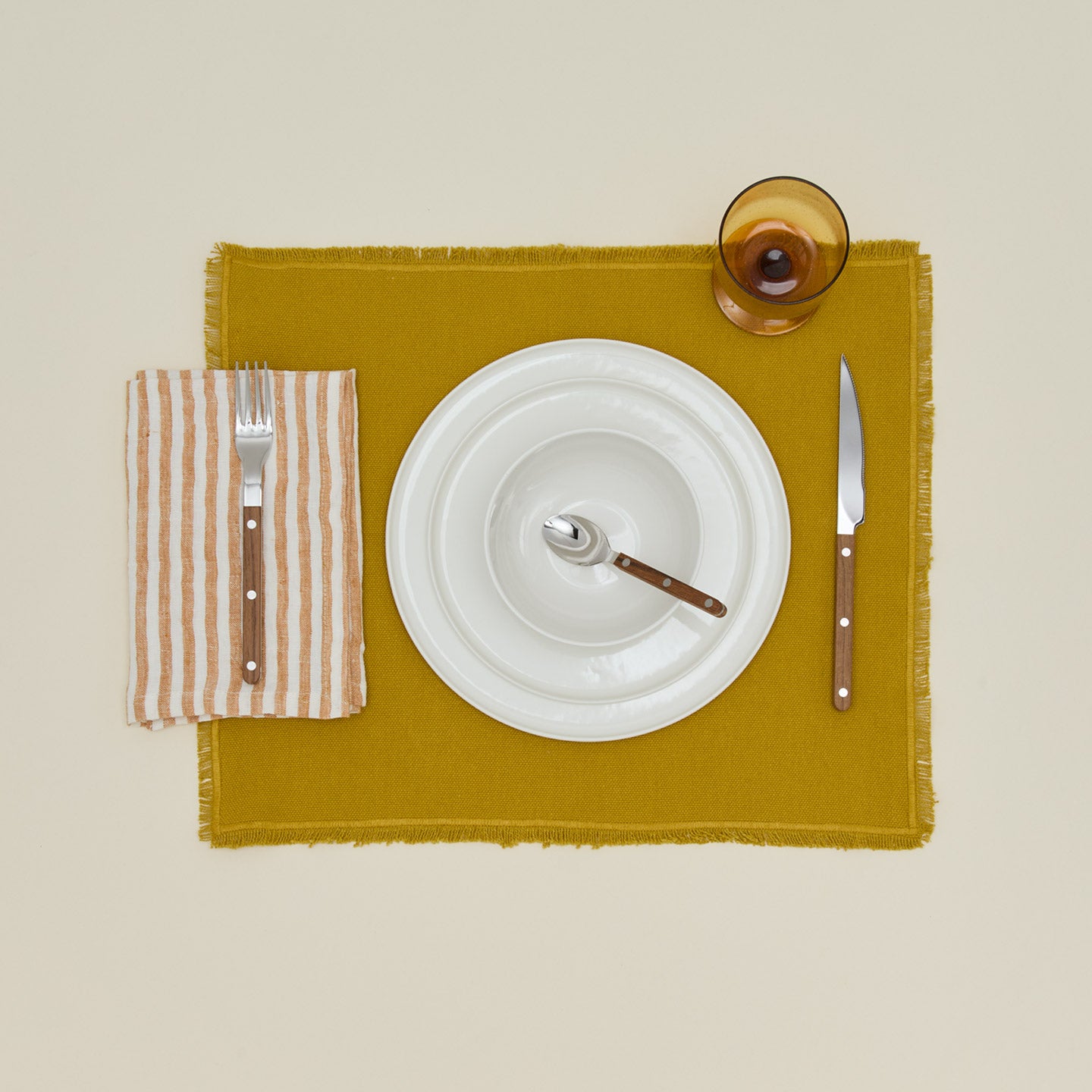 Tell Me More leon striped napkin with place setting