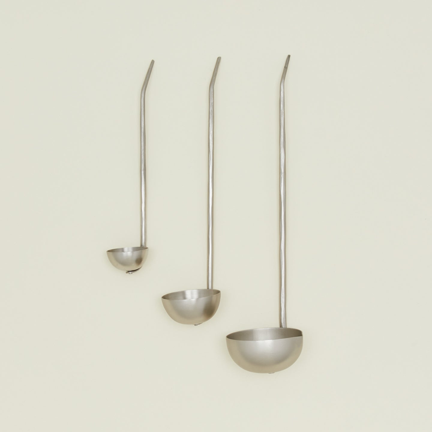 The collective forged pewter ladle set of three