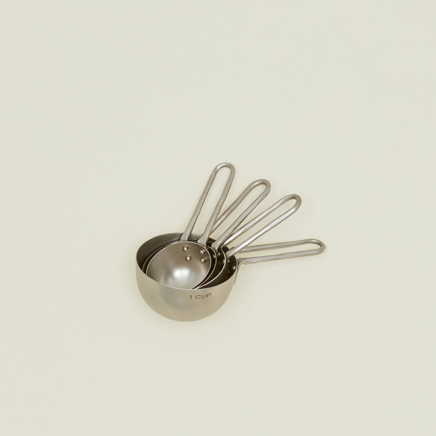 The collective foreged pewter measuring cups, set of 4