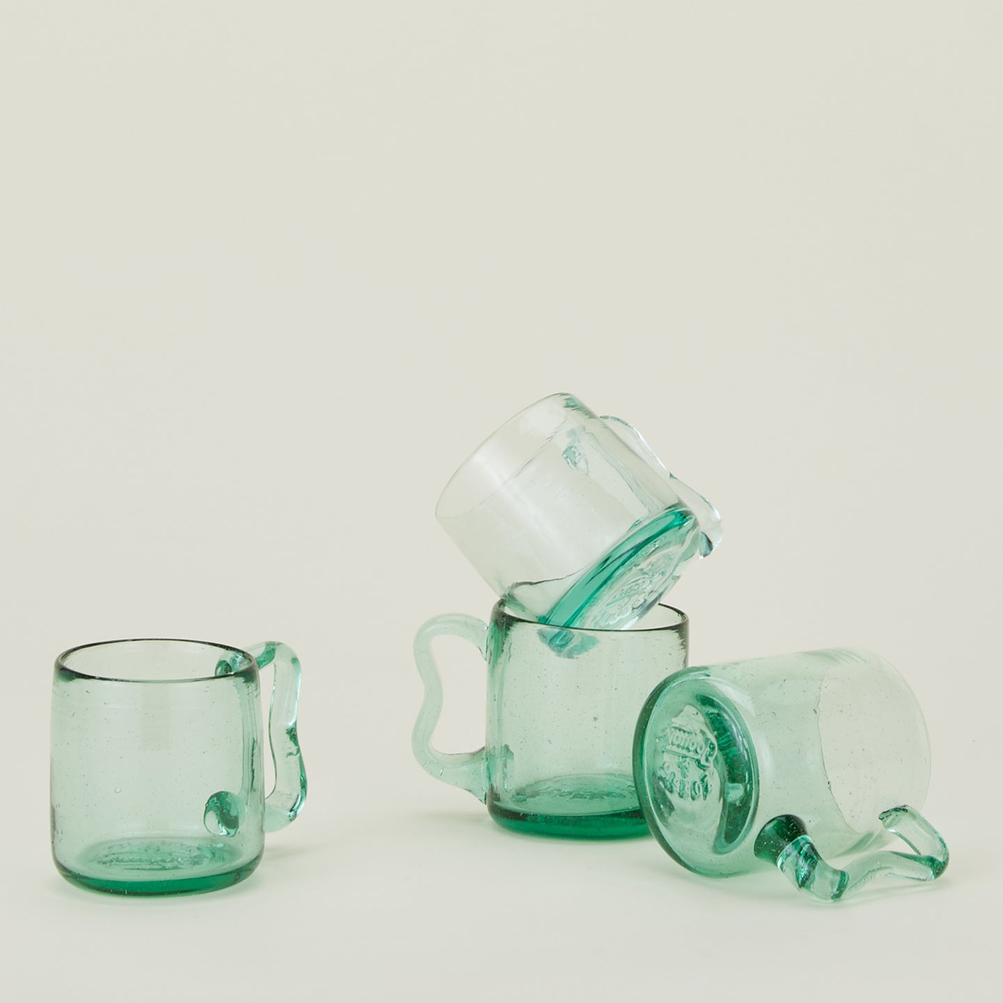 Group of four Wavy Recycled Small Mugs.