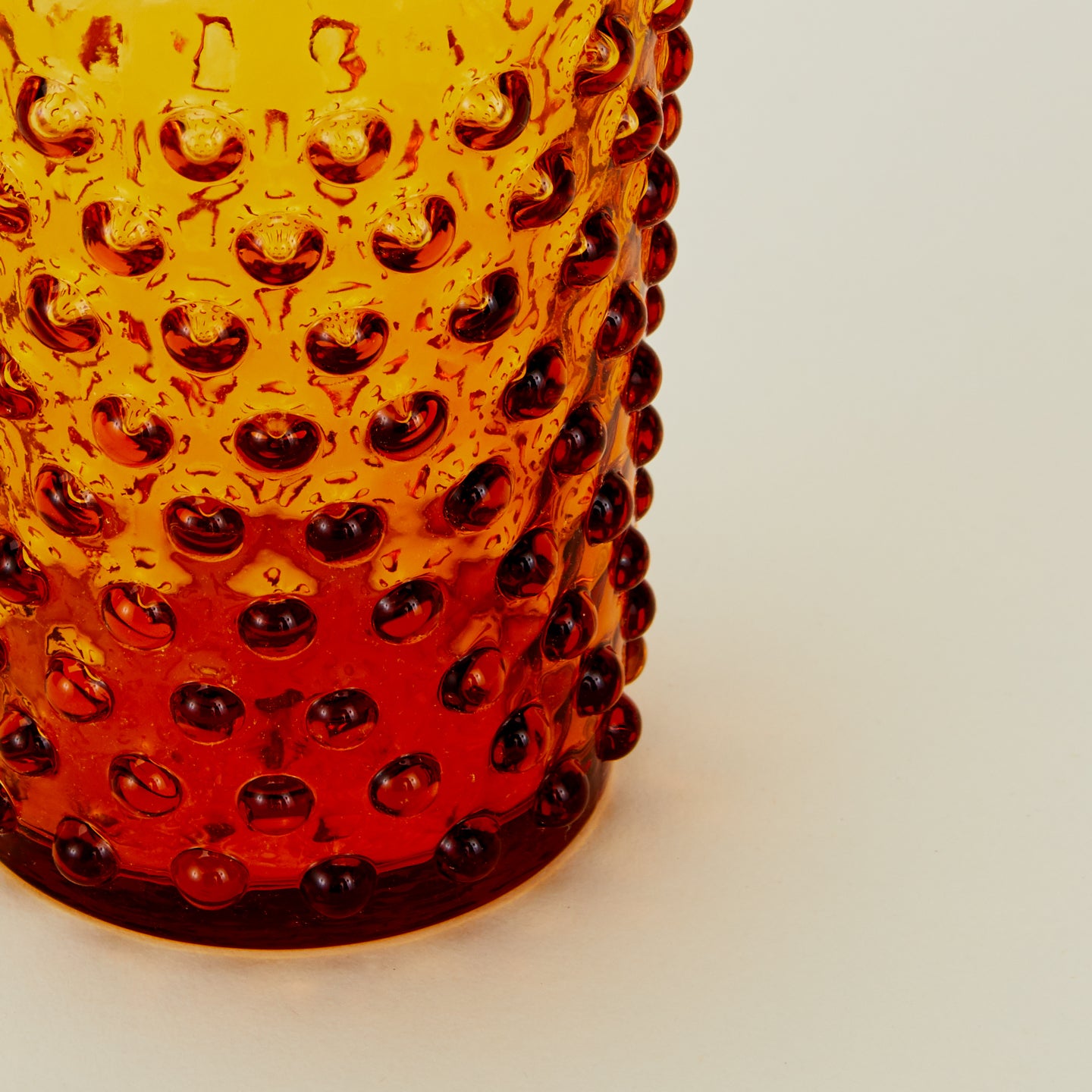 Close up of Hobnail Tumbler in Amber.