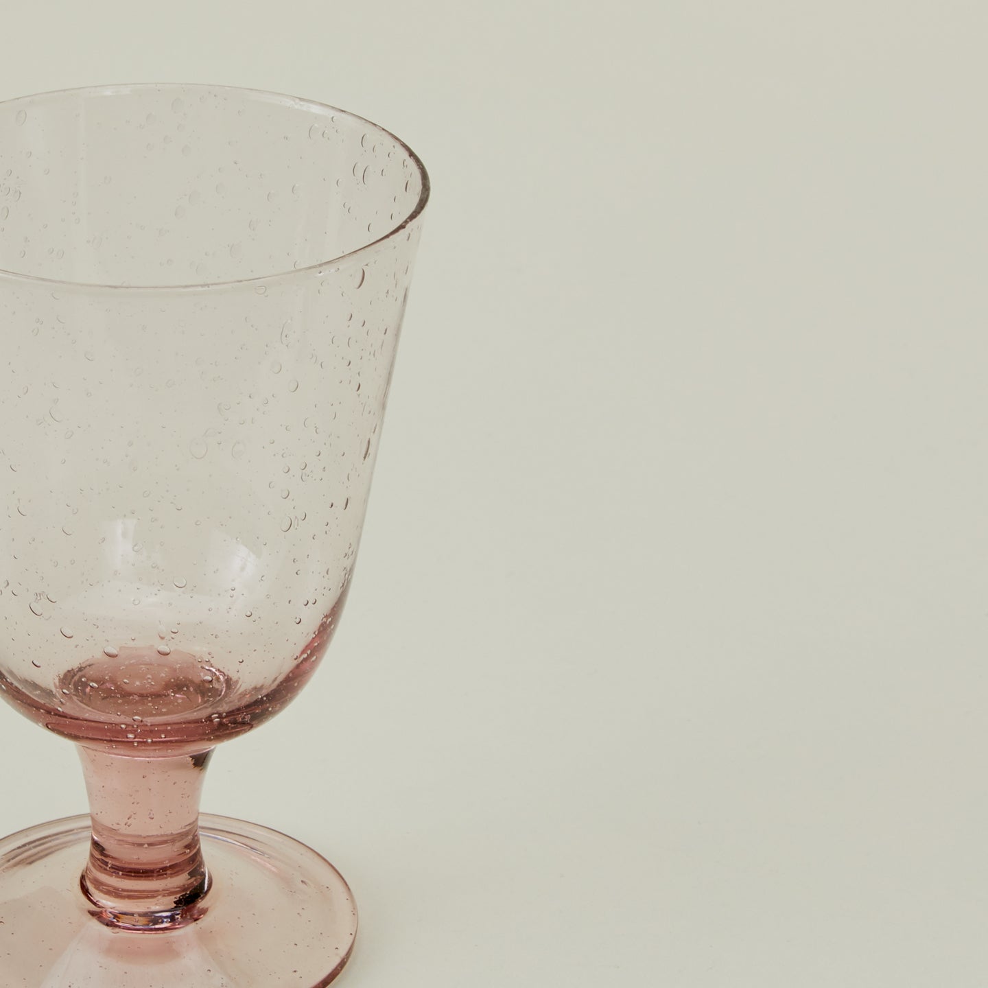 Close up of Stemmed Wine Glass in Blush.