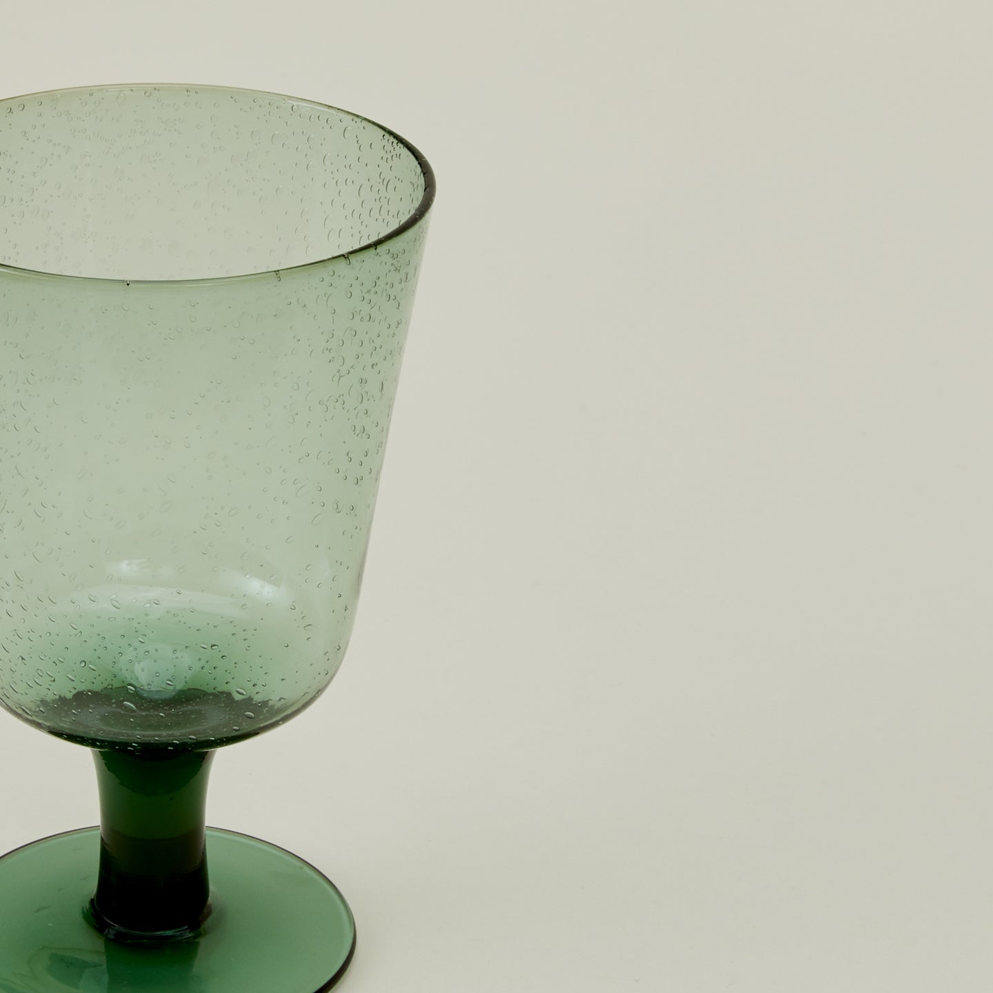 Close up of Stemmed Wine Glass in Jade.