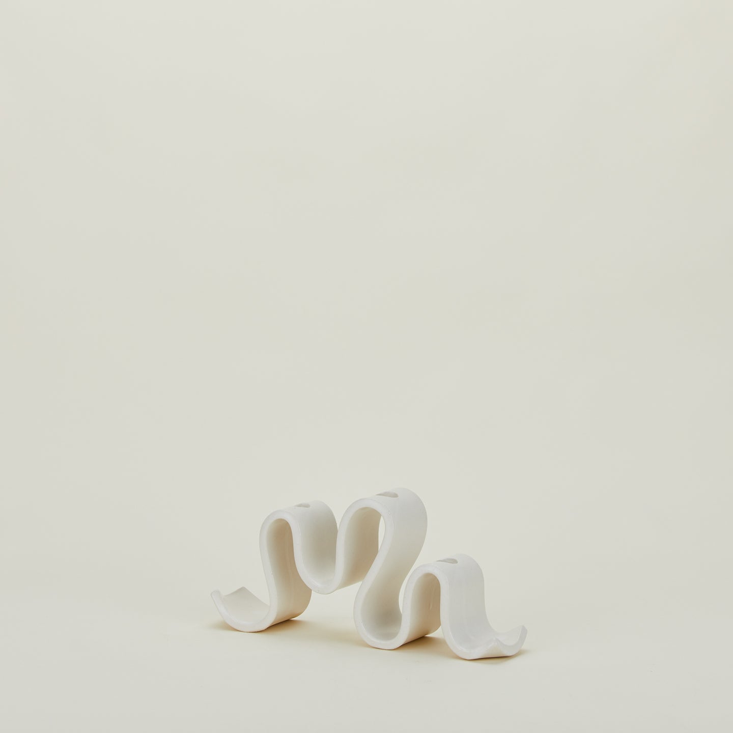 Stoneware Wyat Candelabra viewed from an angle.