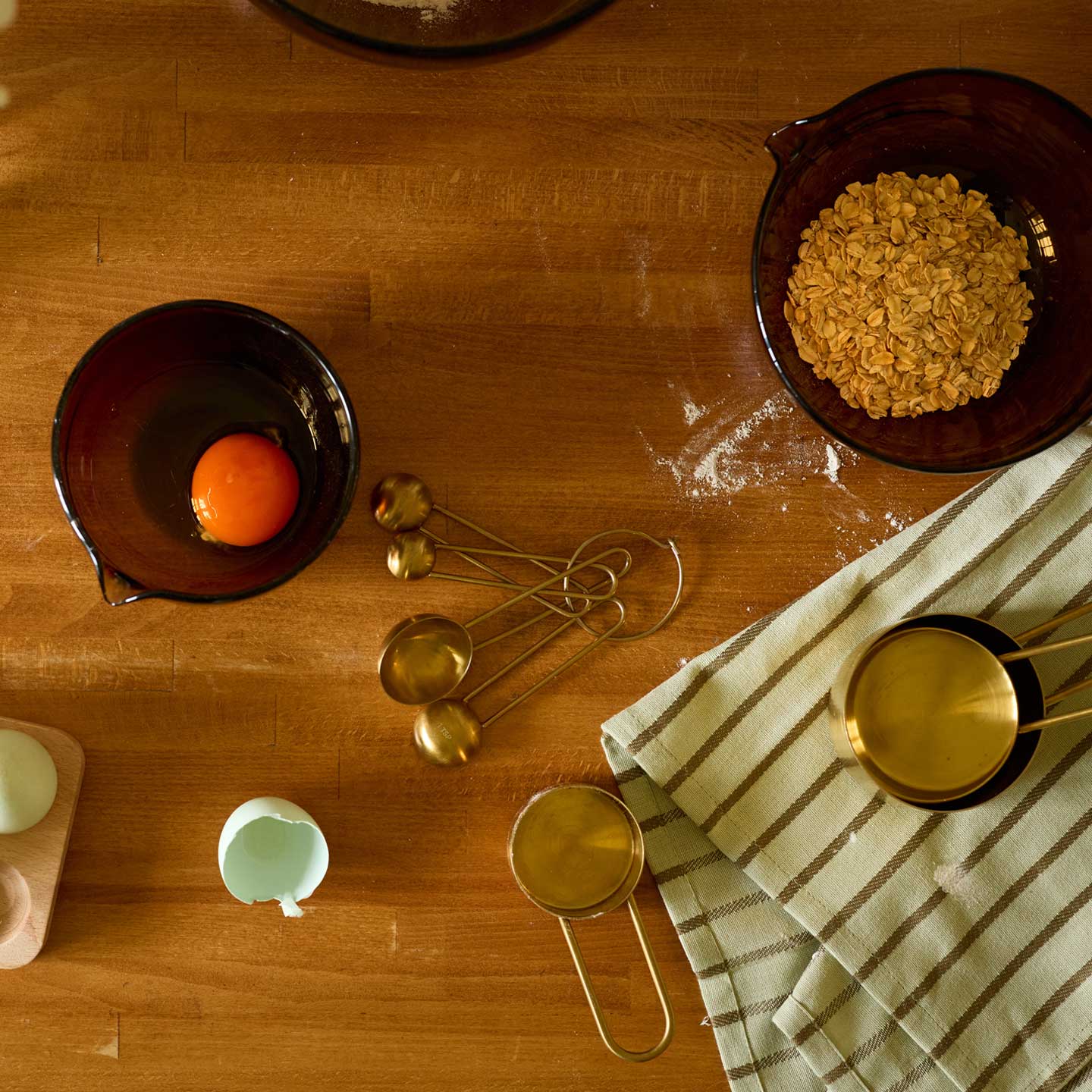 Baking set on wooden counter with towel