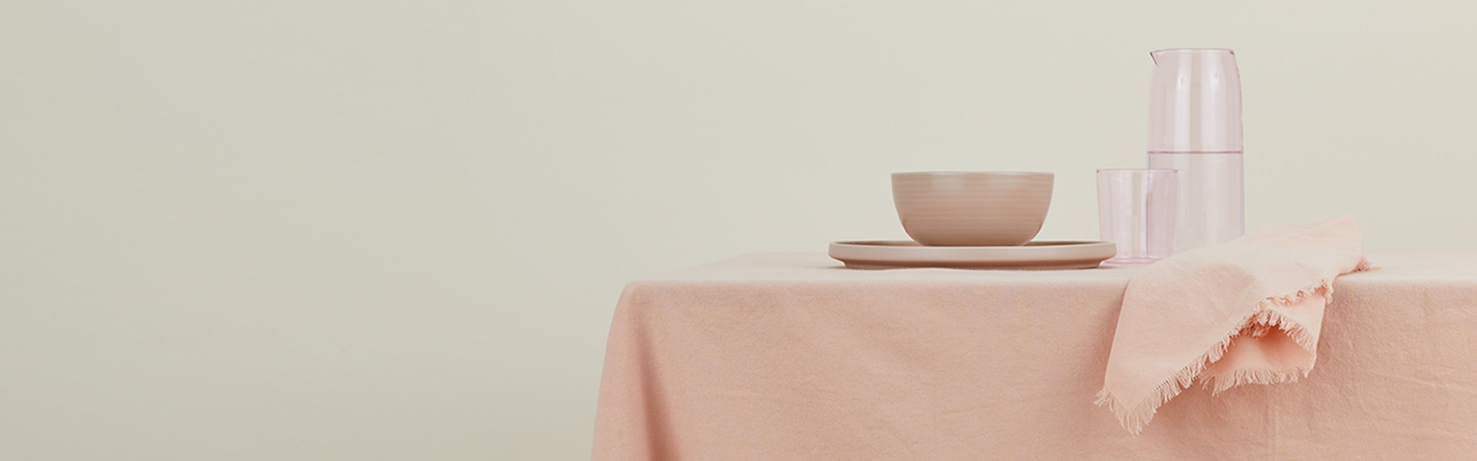 Tonal Blush table setting with HNY Linen napkins, tablecloth and Essential Glass + Dinnerware. 