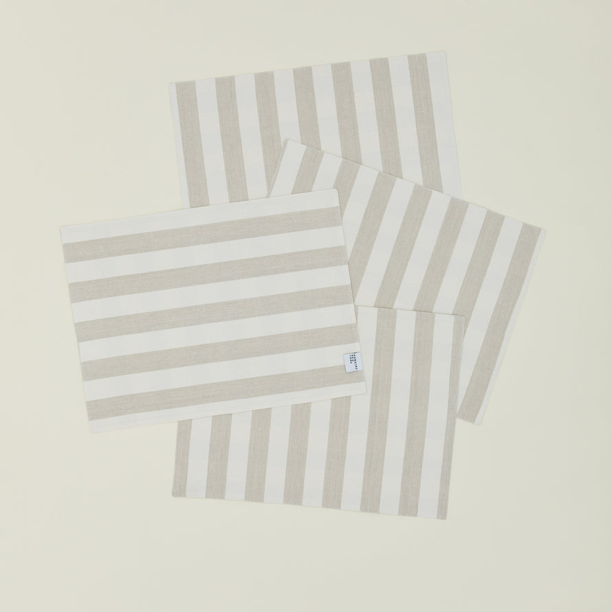 Set of four Essential Striped Placemats in Ivory and Flax.