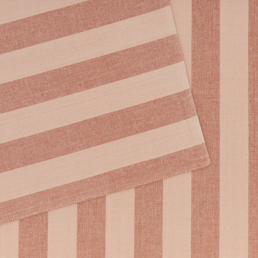 Close up of Essential Striped Placemat in Blush and Terracotta.