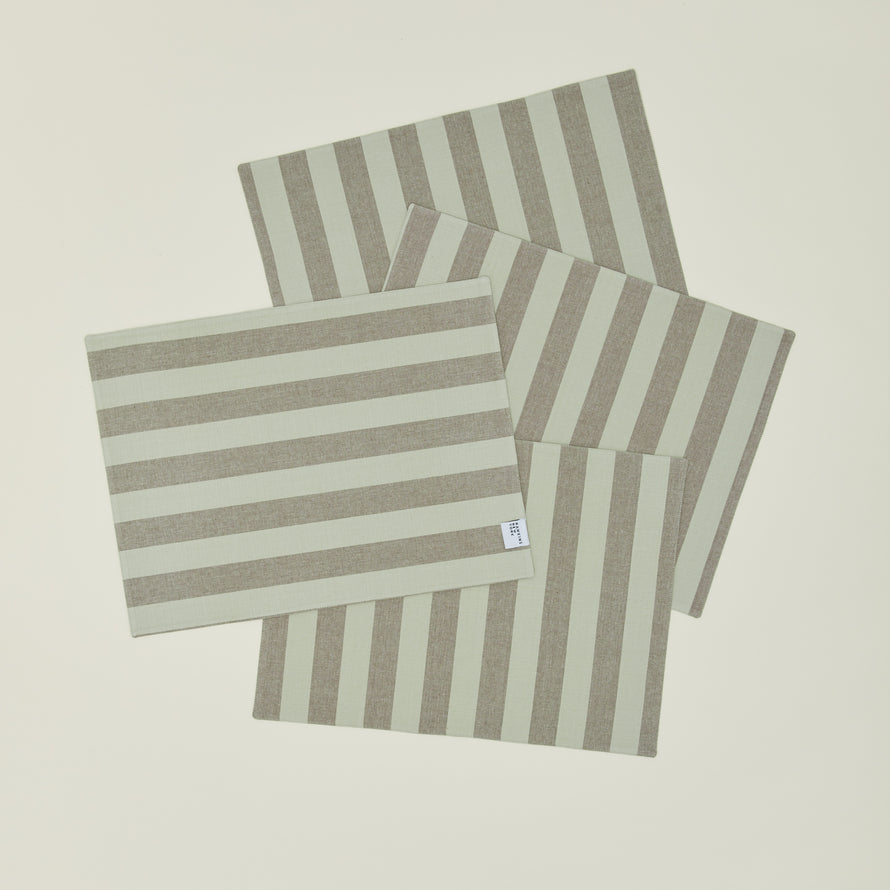 Set of four Essential Striped Placemats in Olive and Sage.
