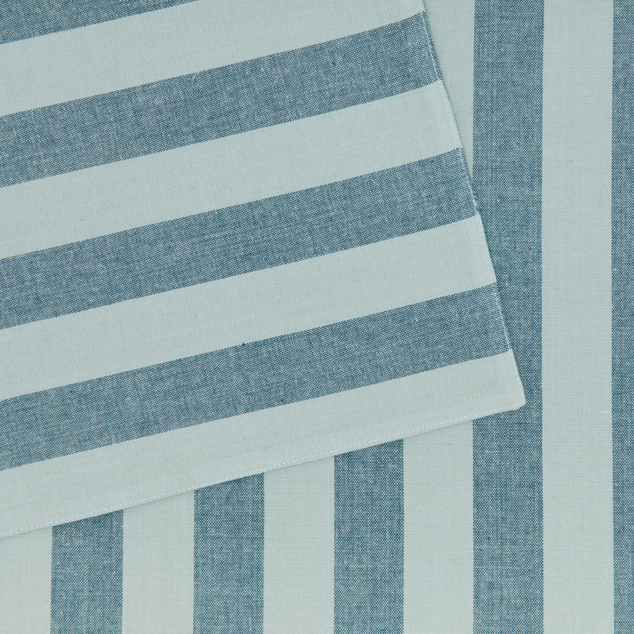 Close up of Essential Striped Placemat in Sky and Peacock.