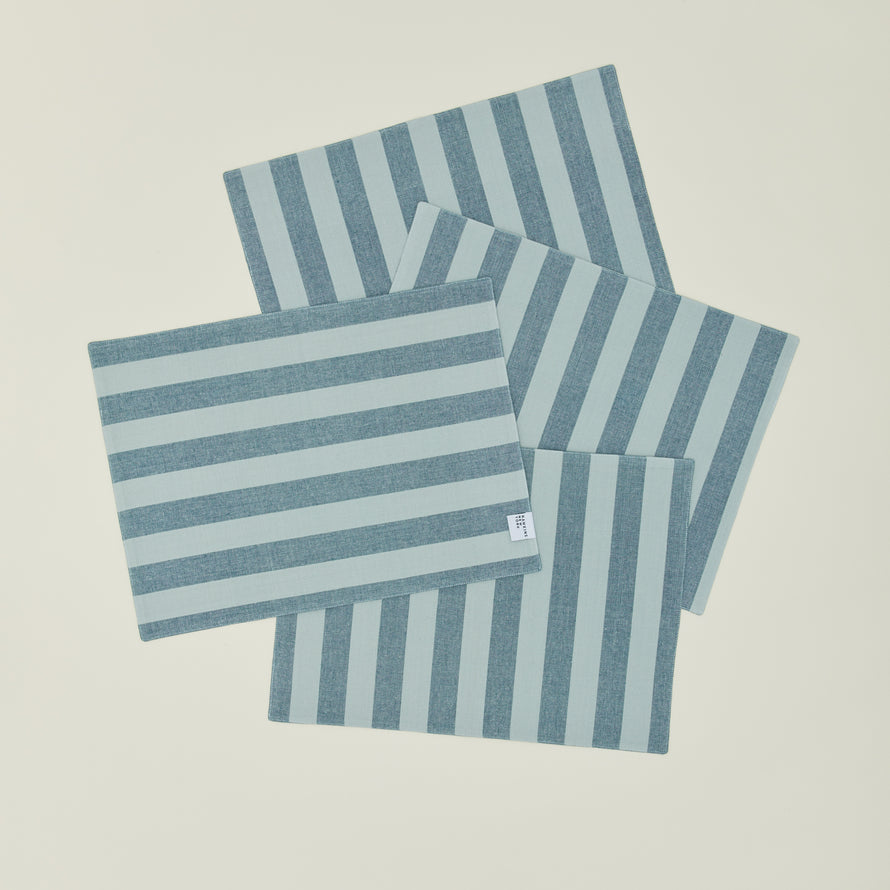Set of four Essential Striped Placemats in Sky and Peacock.