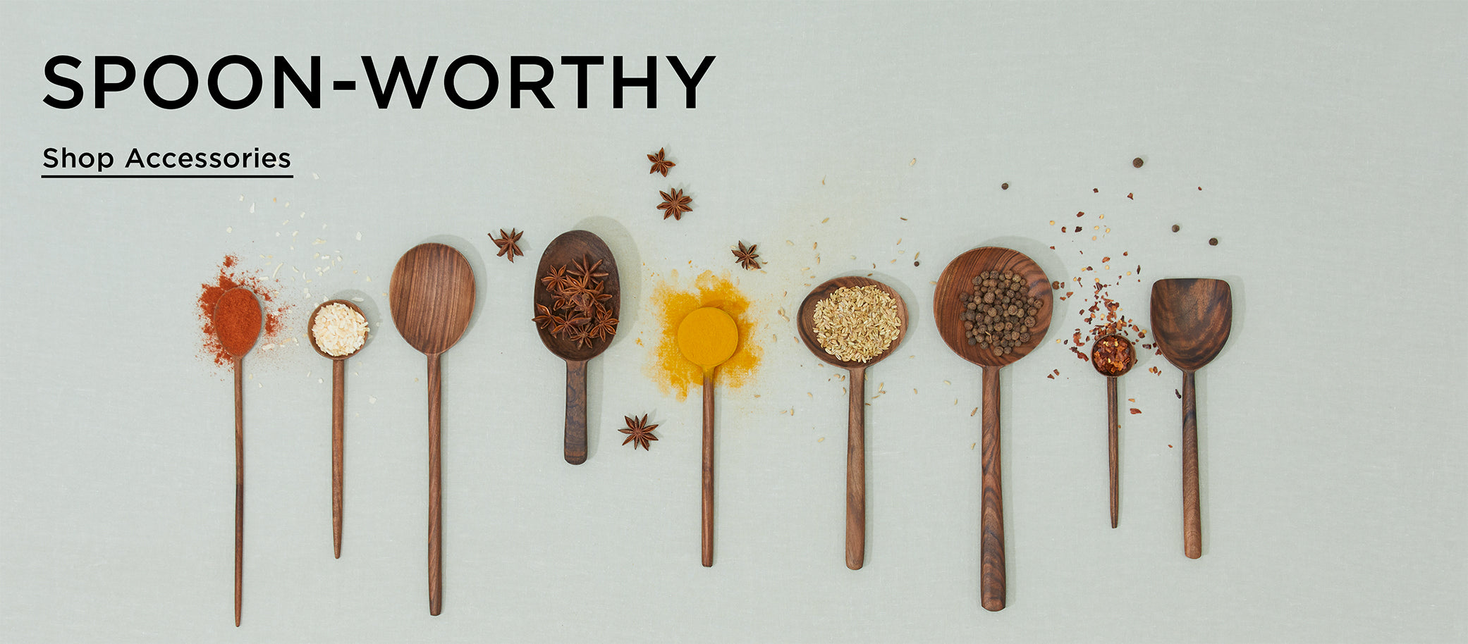 SPOON-WORTHY. Shop Accessories. A group of hand carved walnut spoons and utensils full of a variety of spices.