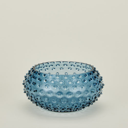 Glass hobnail blue serving bowl.