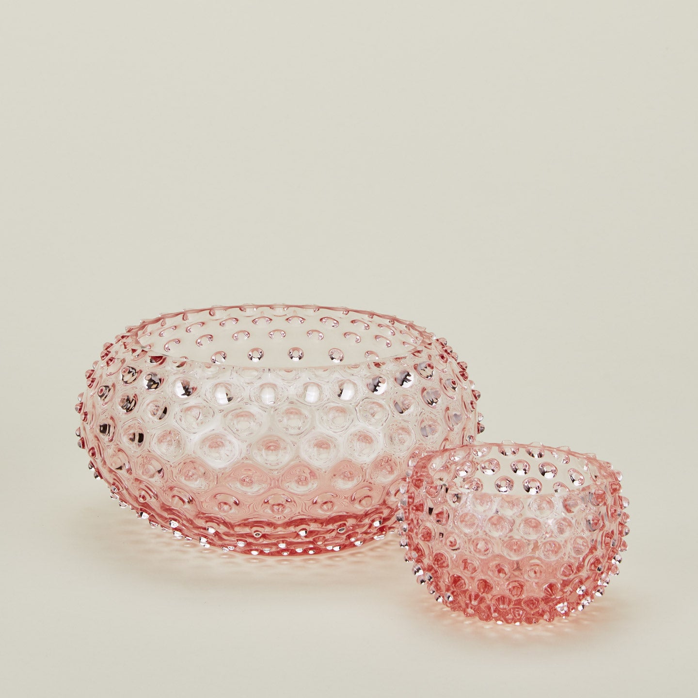 Glass hobnail blush serving and tapas bowls.