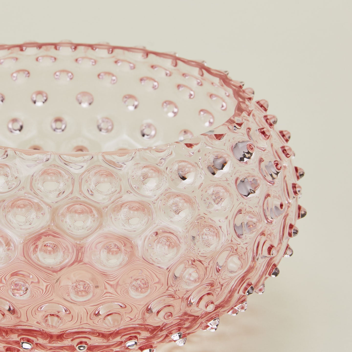 Close up of glass hobnail blush serving bowl.
