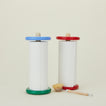Spool paper towel holders in red and blue with scrub brush