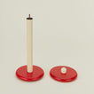 A red and yellow paper towel holder disassembled.