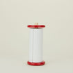 A red and yellow paper towel holder with paper towel roll.