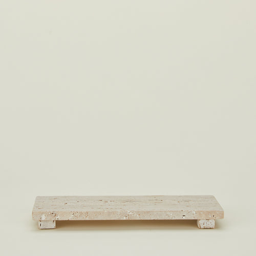 Travertine footed serving board
