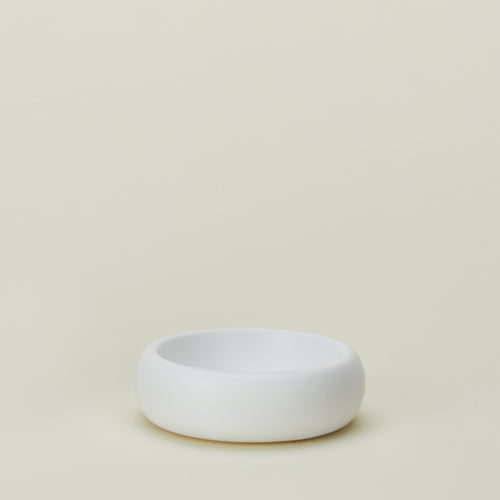 Concave ceramic bowl in white
