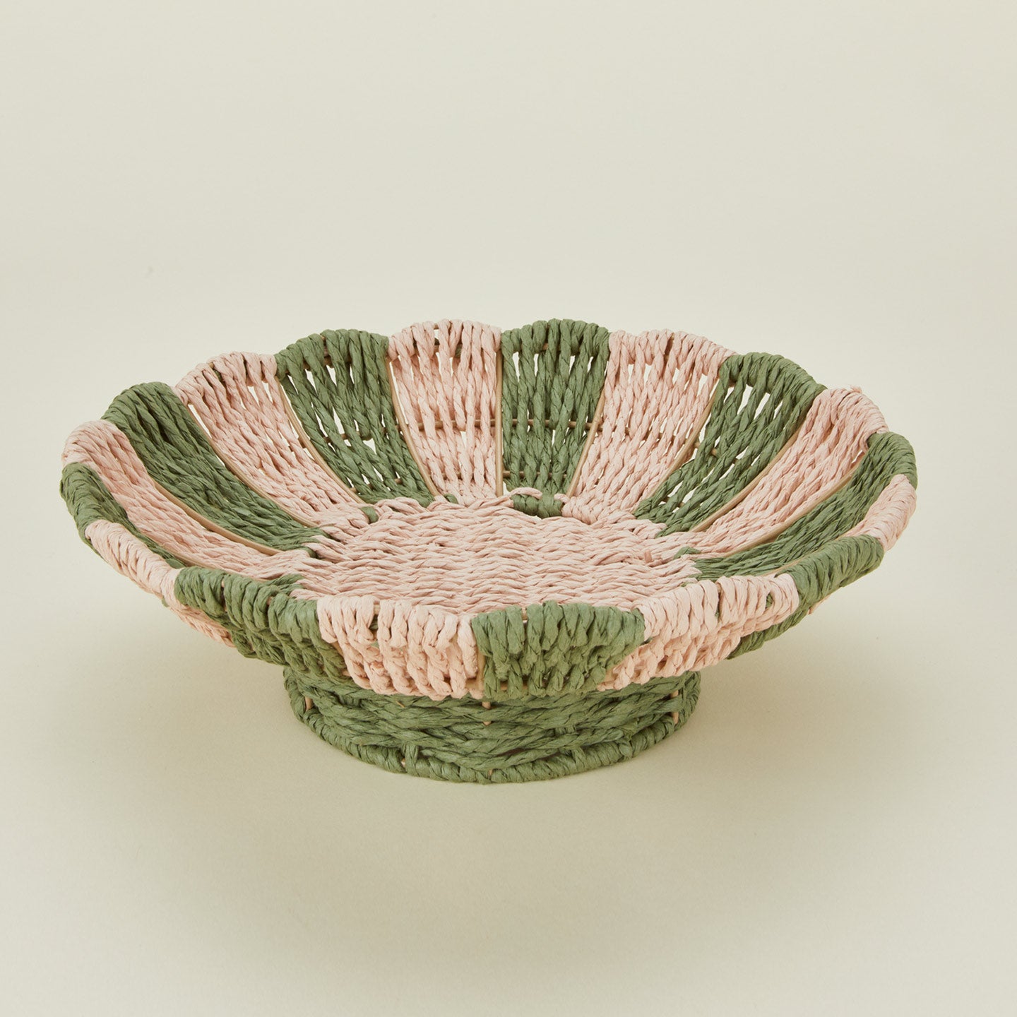 Detailed view of Bloomingville woven rope footed bowl.