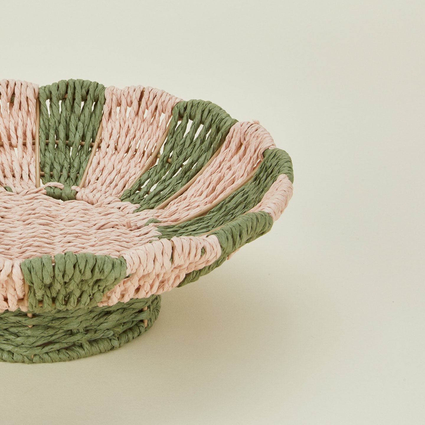 Close up view of Bloomingville woven rope footed bowl.