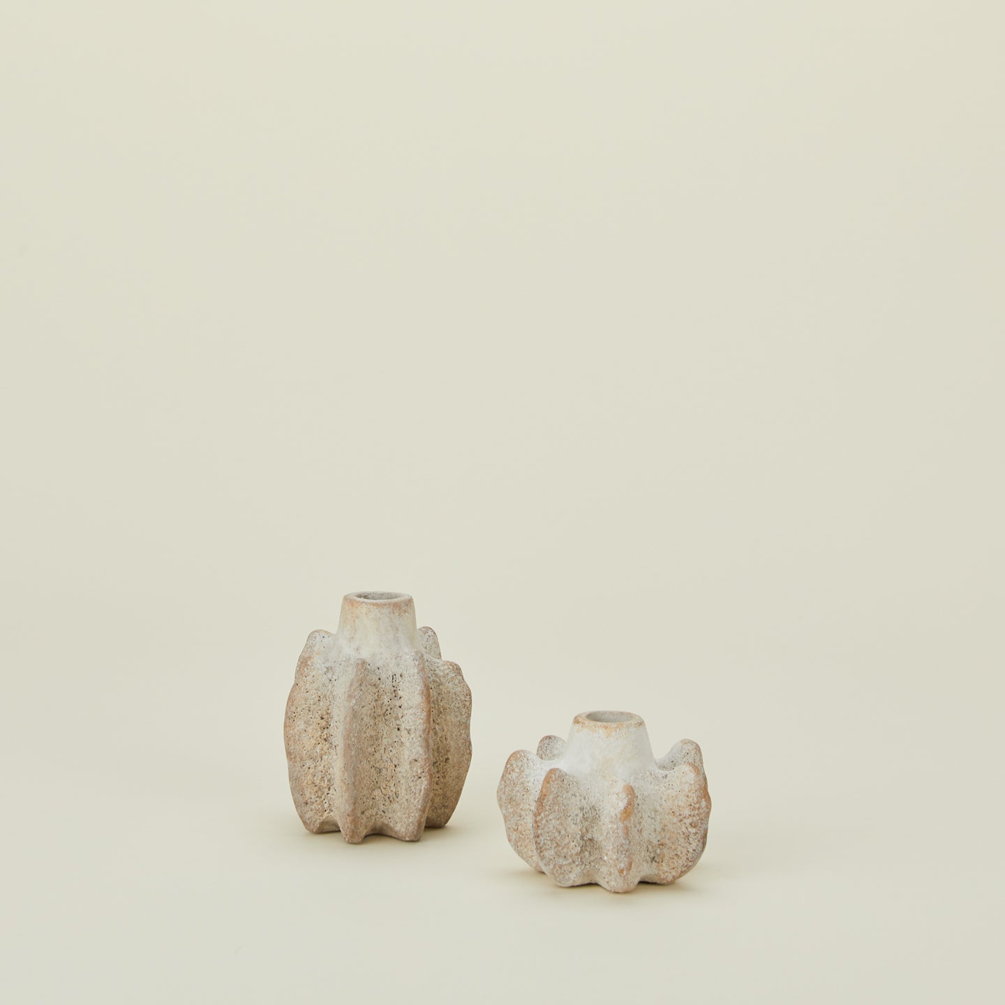 Brutalist candle holders in various sizes.