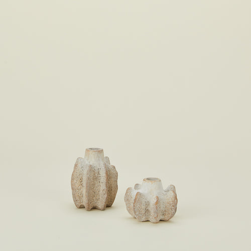 Brutalist candle holders in various sizes.