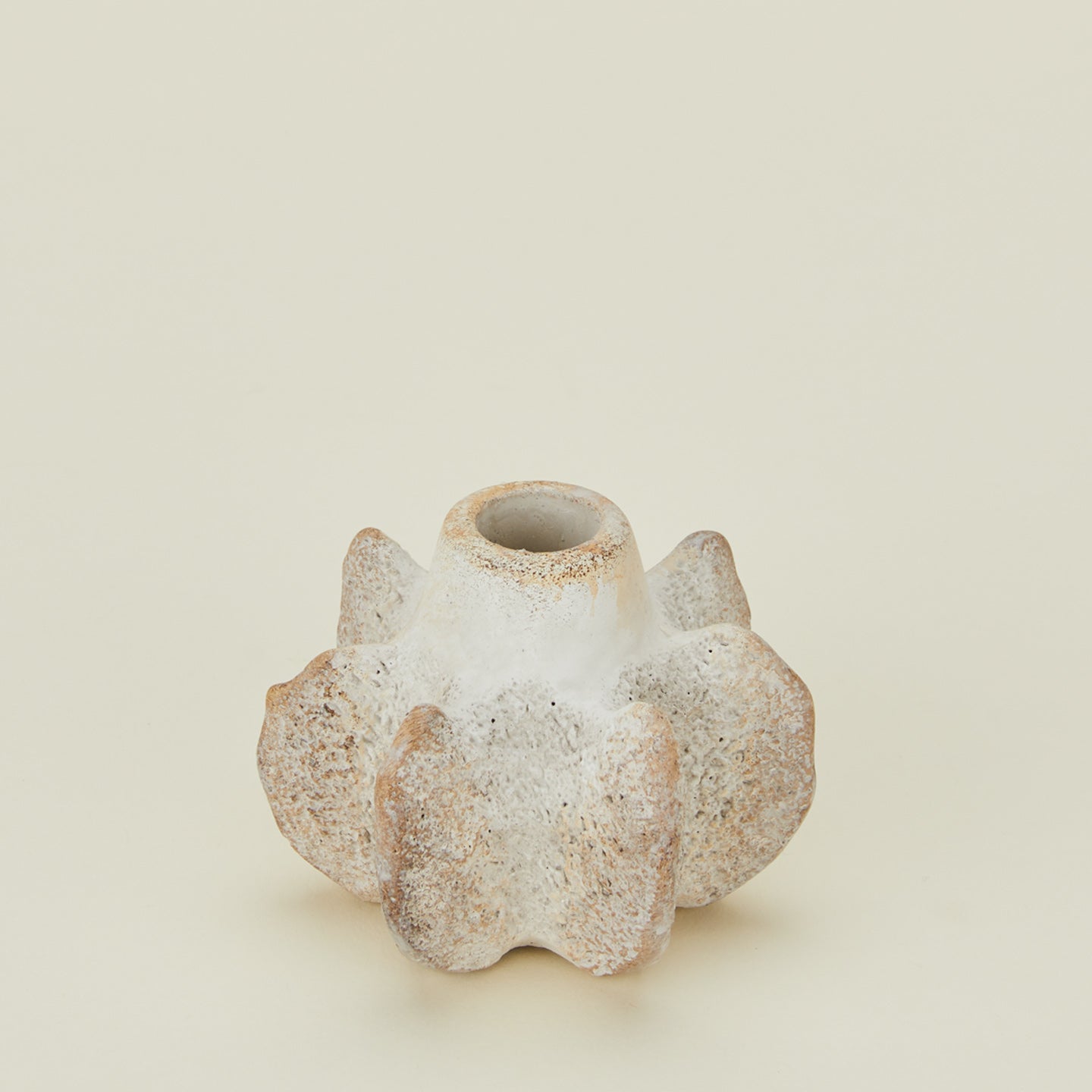 Close up view of  short Brutalist candle holder 