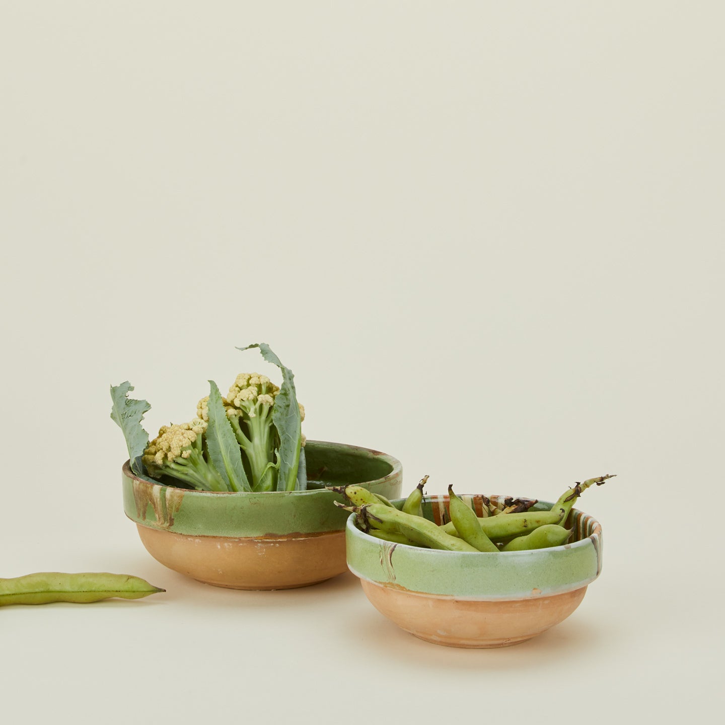 Marbleized glazed bowl family with cauliflower and peas