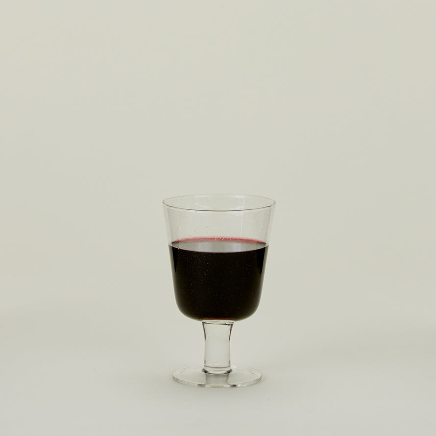 Stemmed Wine Glass in Clear, filled with water.