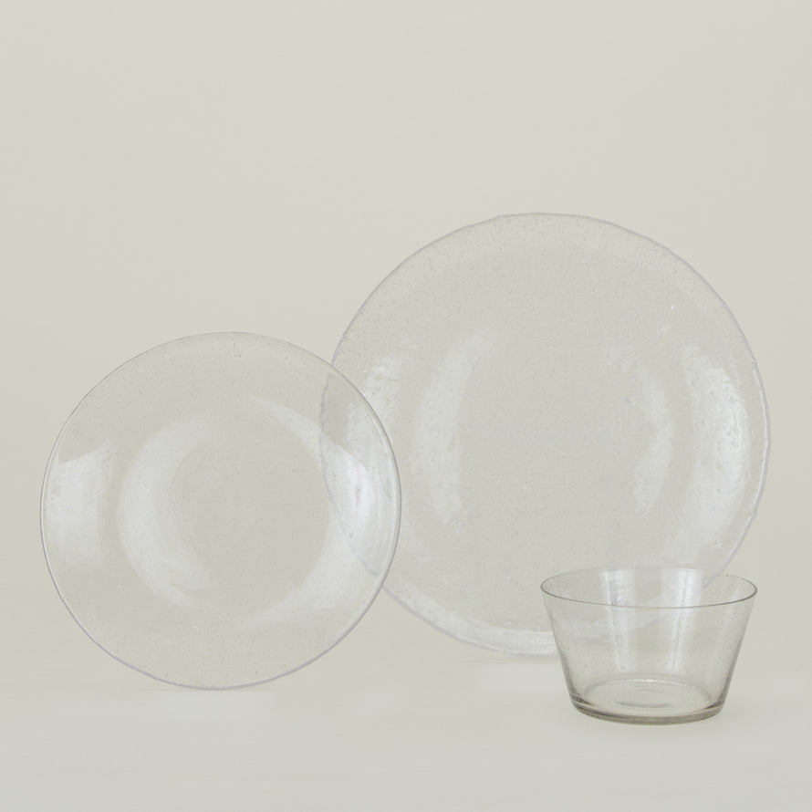 Group of Clear glass salad plate, dinner plate and bowl.