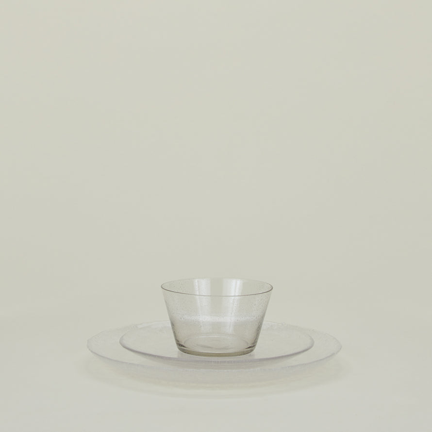 Group of Clear glass salad plate, dinner plate and bowl.