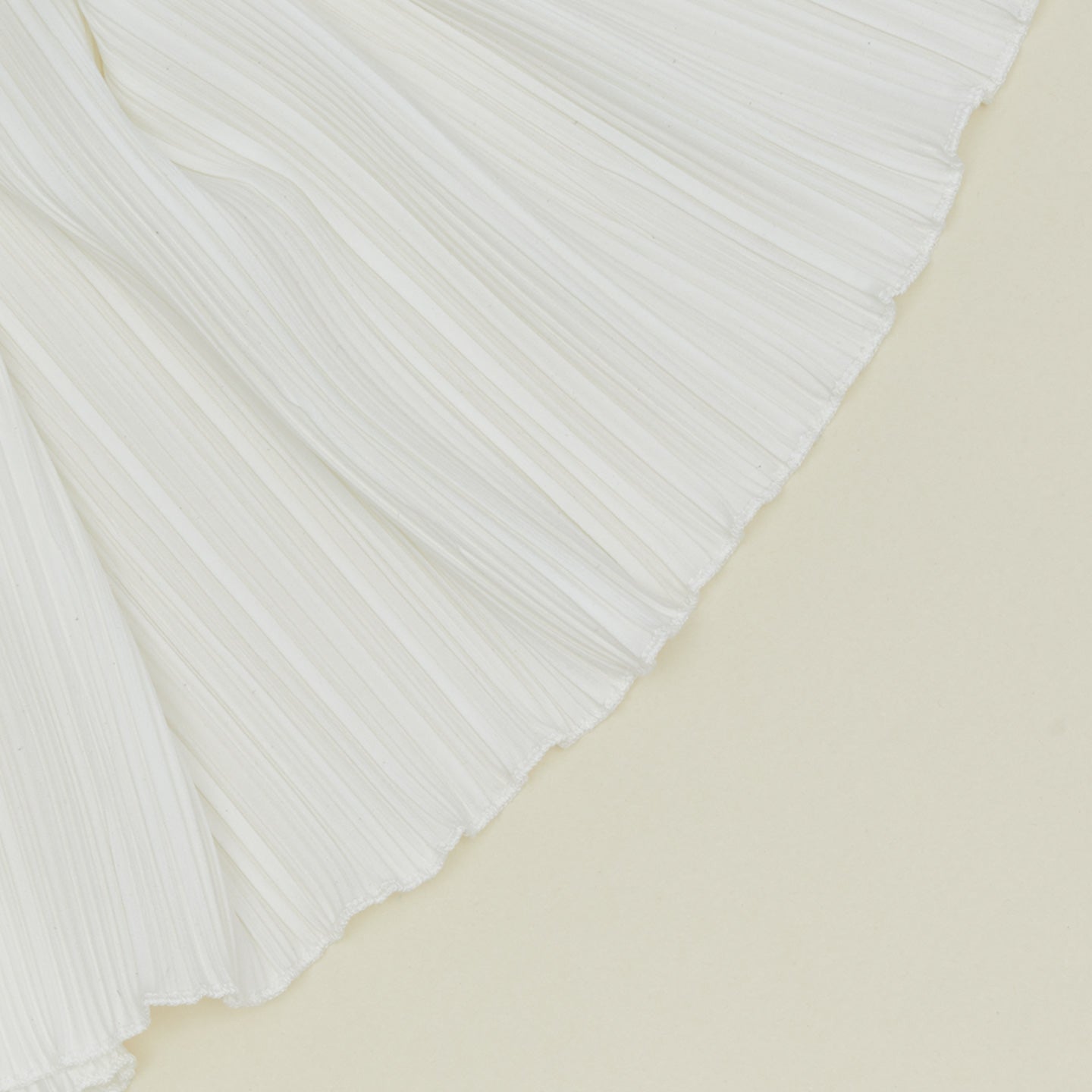 Detailed view of Cahaya pleated napkin in ivory