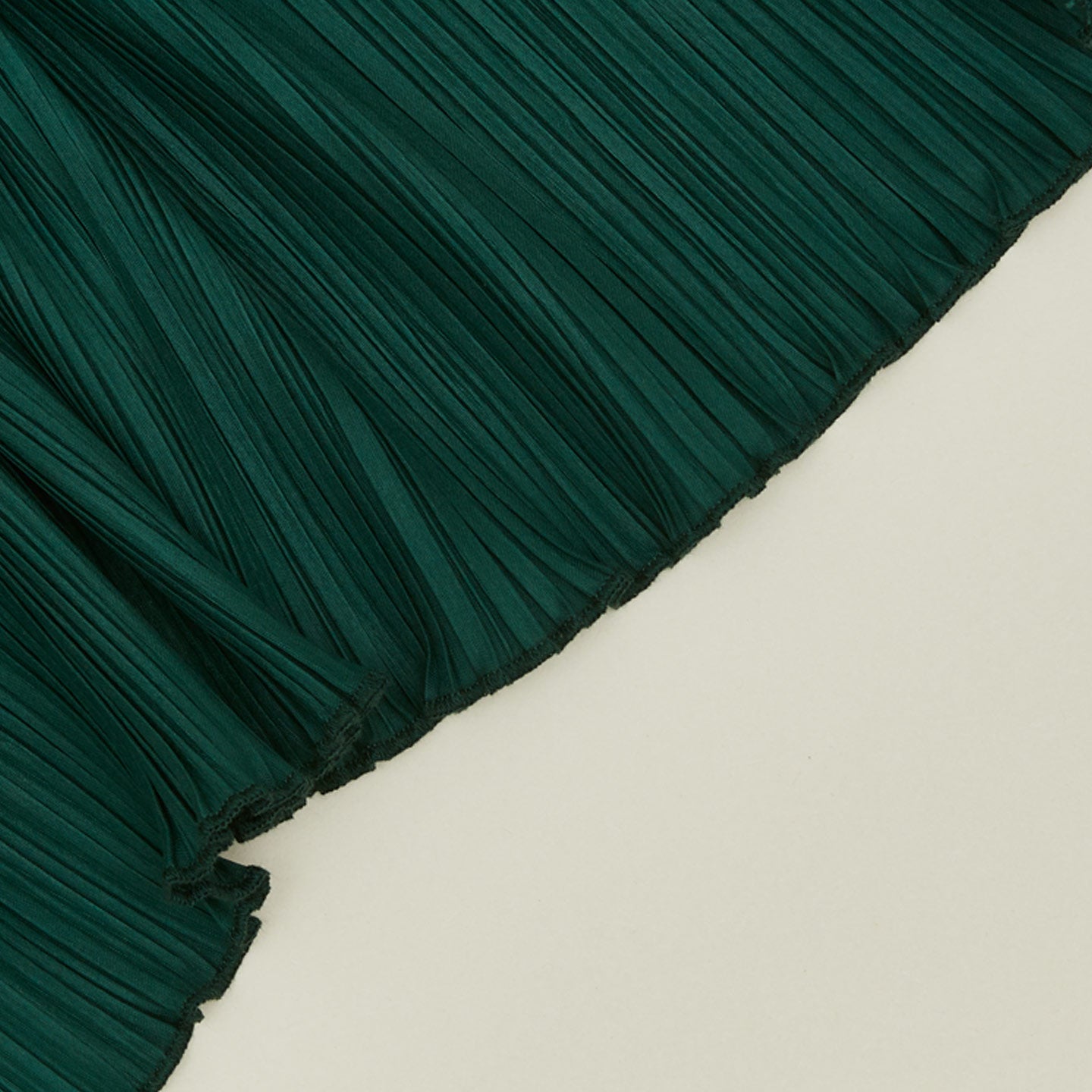 Close up view of Cahaya pleated napkin in olive
