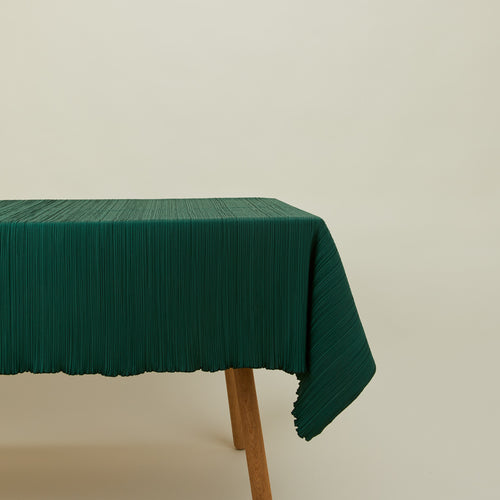 Cahaya pleated tablecloth in olive on table