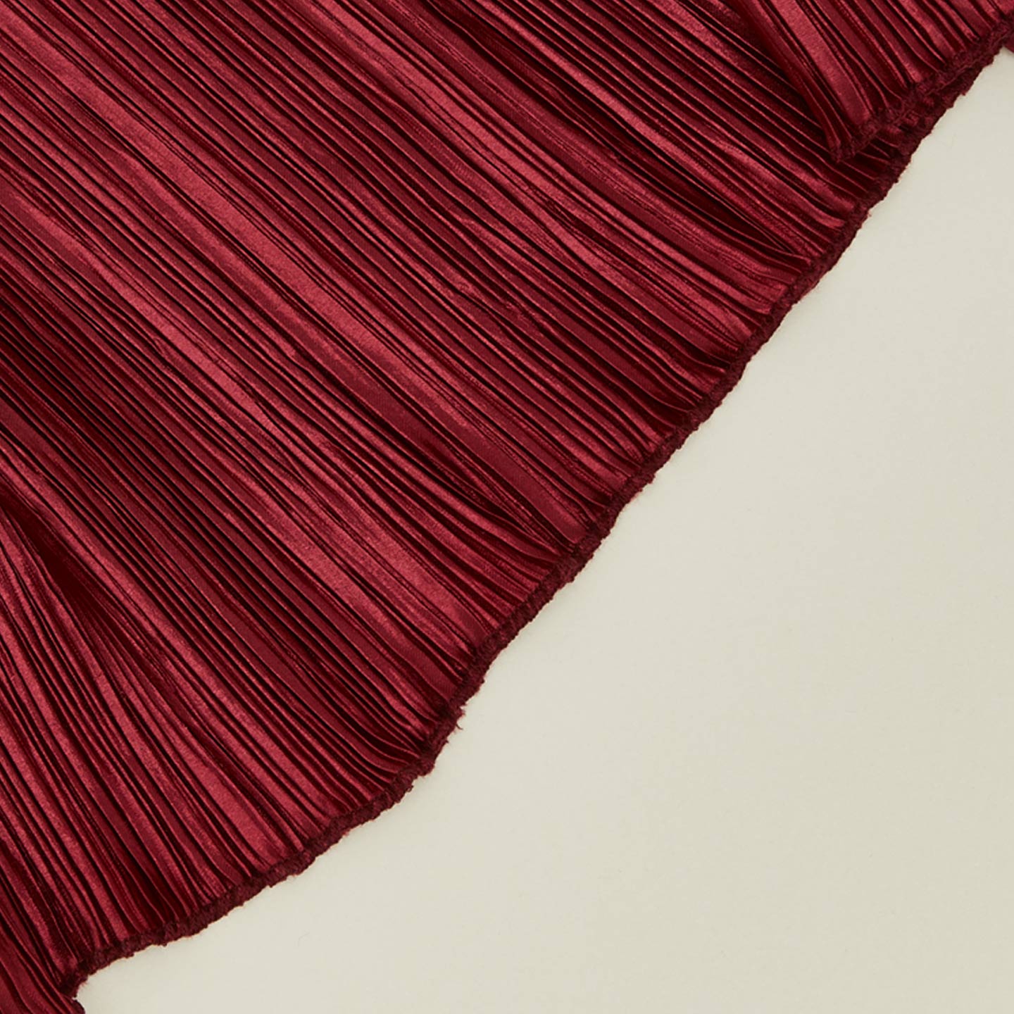 Close up view of Cahaya red pleated napkin