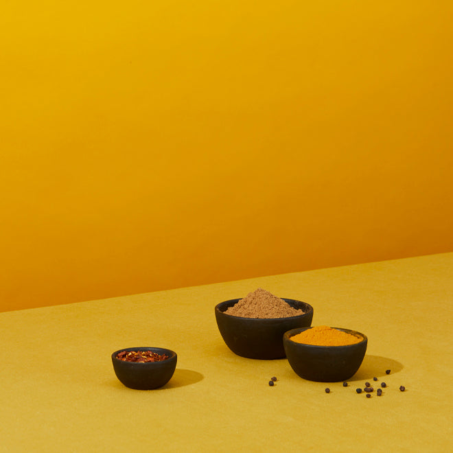 Cast iron bowls, set of 3 on mustard background