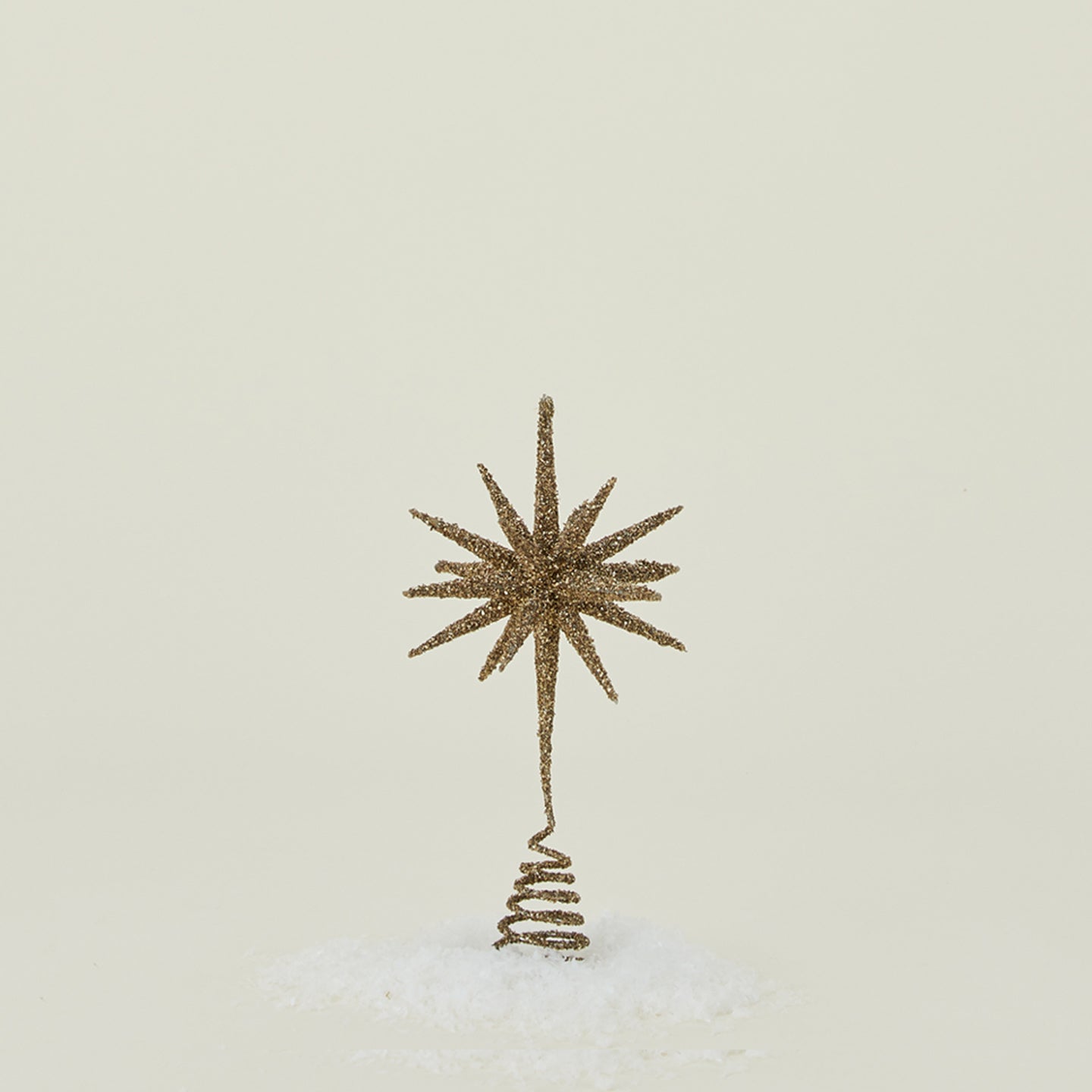 Gold starburst glitter tree topper