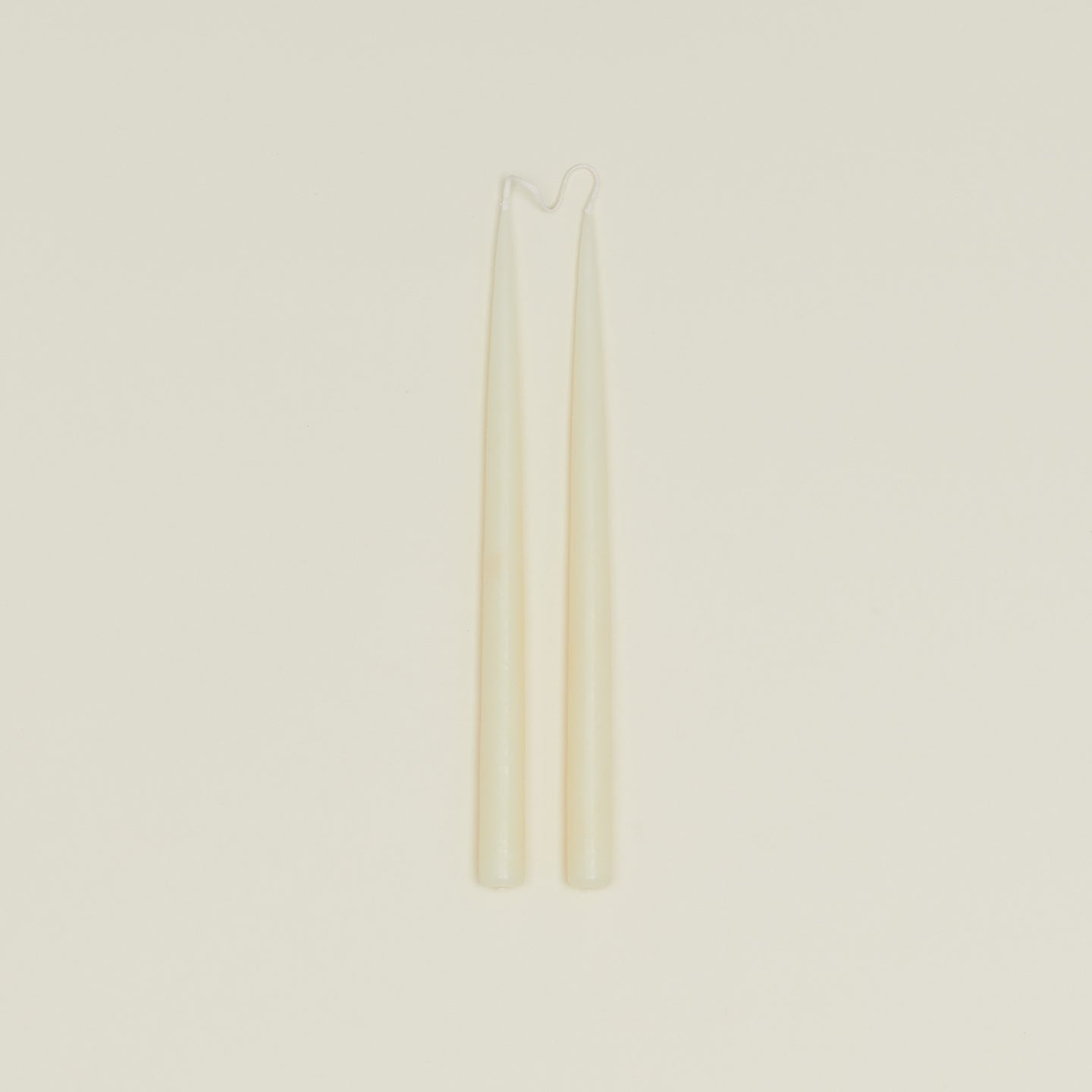 Danica taper candle pair in ivory