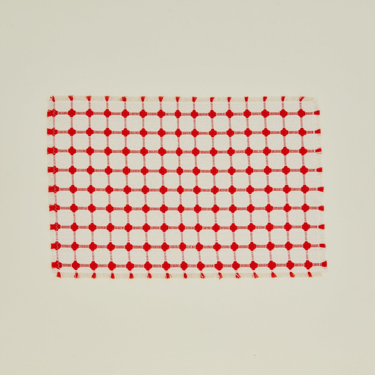 Dove and Donkey wicker fringed placemat in cherry