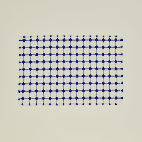Dove and Donkey wicker fringed placemat in cobalt