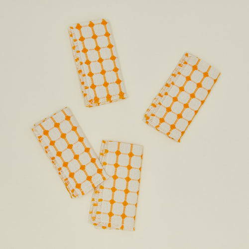Dove and Donkey wicker fringed napkin in marigold, set of 4